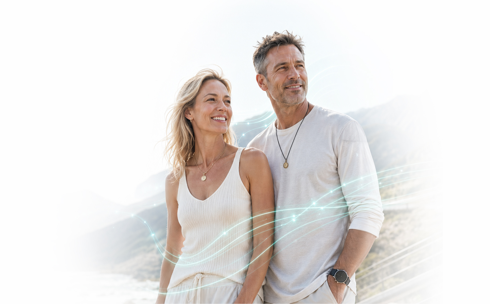 A healthy couple enjoying fresh air and looking happily off camera